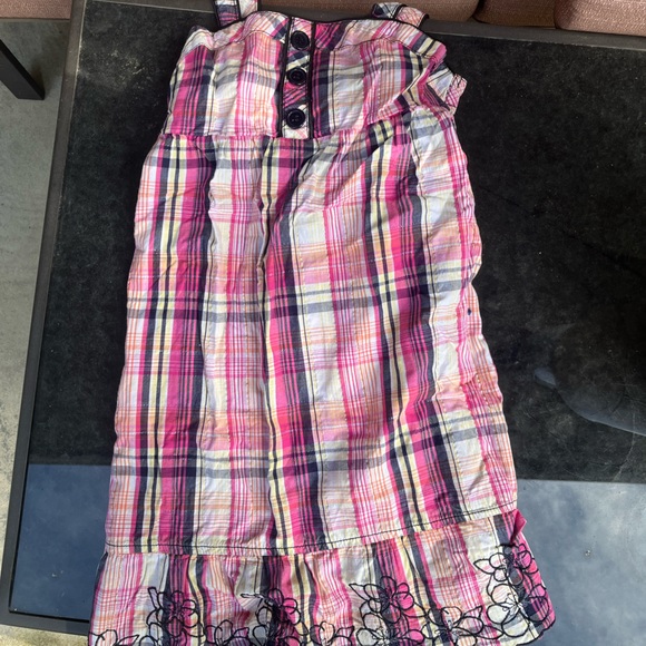 Pink dress with embroidered flowers at the bottom - Picture 1 of 3